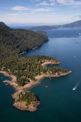 Fototapeta na wymiar Aerial view of Bowen Island during a sunny summer day. Located in Howe Sound, Northwest of Vancouver, BC, Canada.