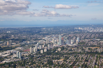 Aerial view of Brentwood Centre with Downtown City in the Background.
