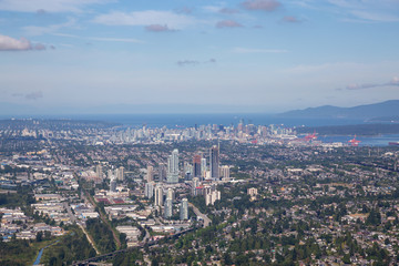 Obraz premium Aerial view of Brentwood Centre with Downtown City in the Background.
