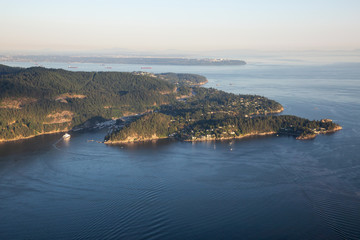 Aerial view of Horseshoe Bay during a sunny summer evening. Taken in Howe Sound, West Vancouver, BC, Canada.