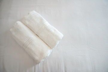 Towels on bed