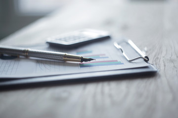 close up.pen and clipboard on the desktop .business concept