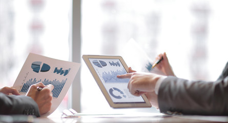 business team is discussing new financial data. photo with copy space