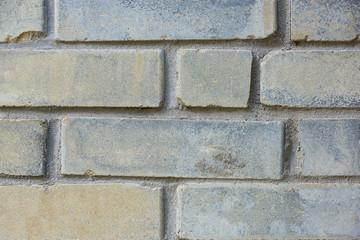 close-up view of old weathered brick wall texture