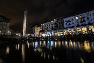 Hamburg Germany at the City hall. Reflections on Water. Night, long exposure.