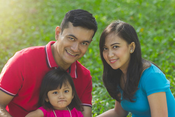 Lovely family outdoors portrait