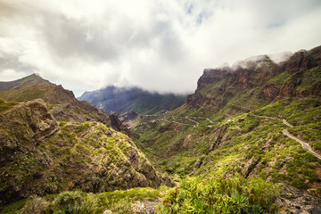 Mountain serpentine. Landscape of the Masca Gorge. Beautiful views of the coast with small villages in Tenerife, Canary Islands