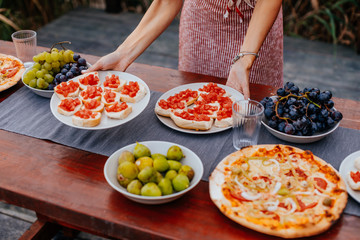 A Woman Preparing a Food for Dinner Party