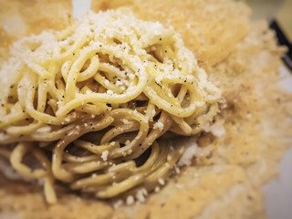 traditional Italian cheese and pepper tonnarelli pasta