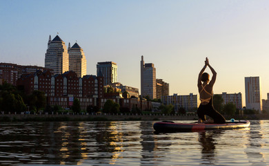 SUP Stand up paddle board woman paddle boarding