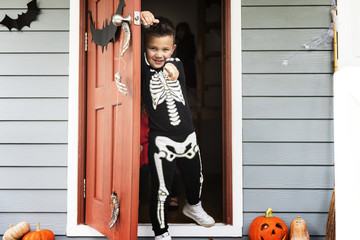 Little boy dressed up as a skeleton