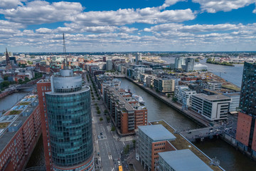 Fototapeta na wymiar Aerial view of amazing port of Hamburg, Germany. Boats, ships and beautiful buildings.