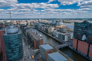 Obraz premium Aerial view of amazing port of Hamburg, Germany. Boats, ships and beautiful buildings.
