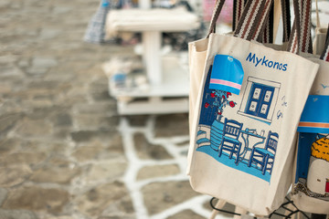 Tote bag souvenir for sale on street market, Greece - obrazy, fototapety, plakaty