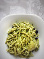 Italian trofie pasta with traditional pesto sauce