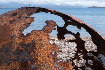 Close up of rusty buoy on the beach at Polbain, north of Ullapool, on the west coast of Scotland. 
