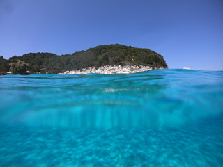 Fototapeta na wymiar Sea level underwater photo of tropical caribbean paradise turquoise beach in exotic island located in an ocean