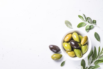 Black and green Olives  on white background.
