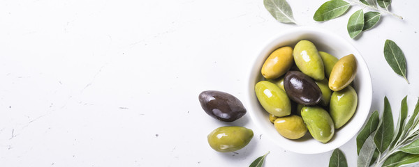 Black and green Olives  on white background.
