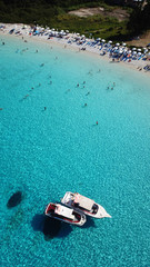 Fototapeta na wymiar Aerial drone bird's eye view photo of iconic tropical paradise beaches of Voutoumi and Vrika with turquoise clear sea, Antipaxos island, Ionian, Greece