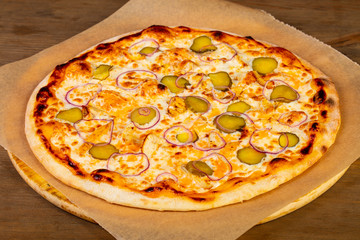 Pizza with pickled cucumbers