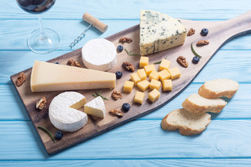 Brie , camembert , parmesan and roquefort