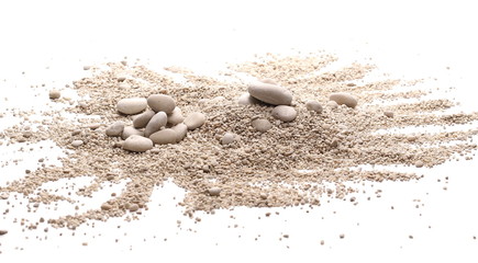 Seaside sand pile with rocks, pebbles isolated on white background and texture