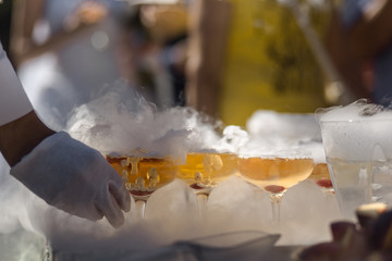 Champagne glasses on gold background. Party and holiday celebration concept