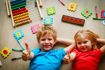 happy kids enjoy learning numbers, arithmetic, abacus calculation