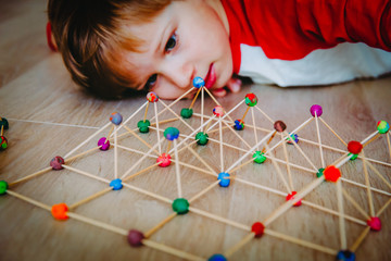 child making geometric shapes, engineering and STEM © nadezhda1906