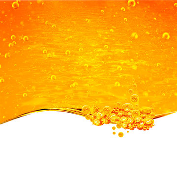 Liquid yellow wave line. Gold bubbles of air. For the project, gold, rest, oil, honey, beer, juice, shampoos or other successful options. On white background an area for text