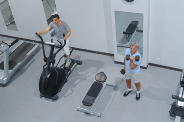 top view of men training in fitness club