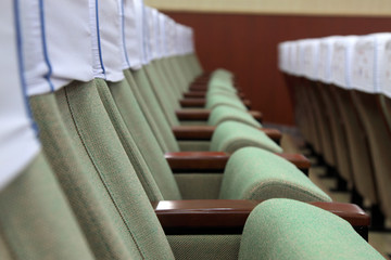 Obraz premium Green chair in the auditorium