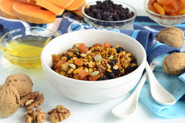 Pumpkin homemade granola with walnuts and dried fruits
