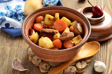 Beef stew with vegetables in a pot