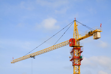 crane tower under the blue sky