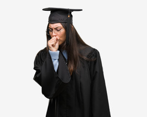 Young hispanic woman wearing graduated cap and uniform feeling unwell and coughing as symptom for cold or bronchitis. Healthcare concept.
