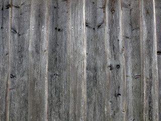 Old wooden wall. Background in natural gray.