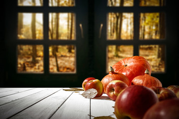 desk of free space and autumn window background 