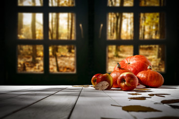 desk of free space and autumn window background 