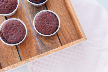 a concept of baking sweet cupcakes and muffins at home