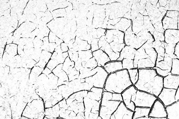 Old stucco wall with cracked paint, black and white photo