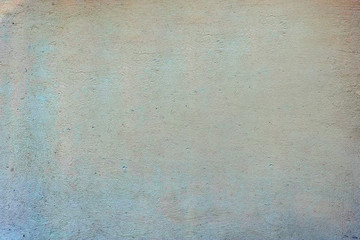 Smooth painted stucco wall, blue-yellow gradient