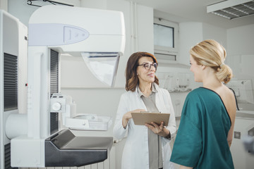 Doctor and Patient on Mammography Examination