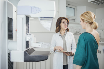 Doctor and Patient on Mammography Examination