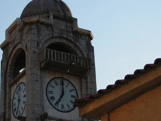 Fototapeta na wymiar Old clock tower at Dimitsana town in Peloponnese Greece