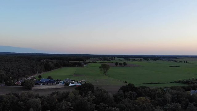 Aerial drone shot of Sunset in Dutch landscape, pan shot