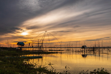 Fototapeta premium Fishing tools of fisherman in the morning at Huai Luang dam, Udonthani province, Thailand.