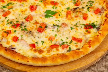 Seafood pizza with tomatoes