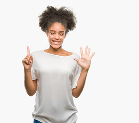 Young afro american woman over isolated background showing and pointing up with fingers number six while smiling confident and happy.